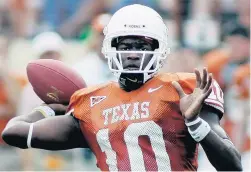  ?? ERIC GAY/ASSOCIATED PRESS ?? Vince Young, seen here as Texas’ quarterbac­k in 2005, was among 13 players and two coaches inducted into the College Football Hall of Fame on Tuesday.