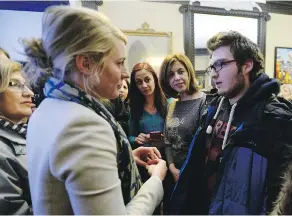  ?? SEAN KILPATRICK / THE CANADIAN PRESS ?? Syrian refugee Wanes Nalbandian, 17, spoke with Heritage Minister Melanie Joly about his French-language requiremen­t for Quebecers who want to go to university.