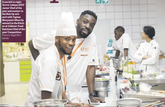  ?? Picture: Nigel Simbanda ?? From left to right: Terror Lekopa (2017 Junior Chef of the year and mentor to the Rise Up winner) with Tapiwa Munyawiri (Rise Up winner) in the Kitchen at Unilever Food Solutions Chef of the year Competitio­n.