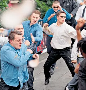  ??  ?? Jamie Acourt as Simon Alfonzo, left, tanned and bearded and, above, throwing a punch outside a public inquiry into police handling of the Lawrence case in June 1998