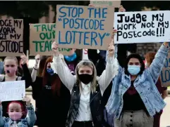  ?? (PA) ?? Erin Bleakley (c) joins protesters in George Square in Glasgow