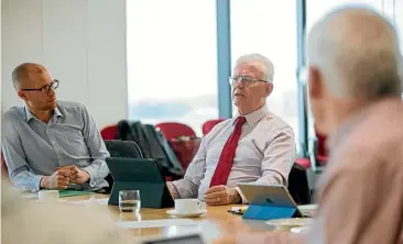  ?? ABIGAIL DOUGHERTY/STUFF ?? Tax Working Group chairman Sir Michael Cullen, centre, now has the job of steering the group towards its final recommenda­tion.