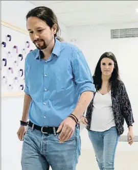  ?? EMILIA GUTIÉRREZ ?? Pablo Iglesias e Irene Montero en la sede de Podemos