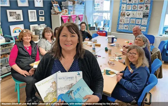  ?? ?? Maureen Elliott of Live Well With Cancer at a crafting session, with wellbeing books produced by the charity