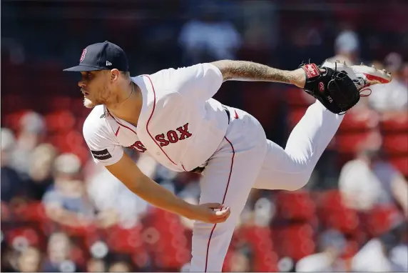  ?? MICHAEL DWYER — THE ASSOCIATED PRESS ?? Boston Red Sox starting pitcher Tanner Houck throws against the New York Yankees in the first inning during a 5-0 victory at Fenway Park.