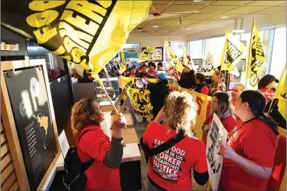  ?? PHOTOS BY CHRIS RILEY/TIMES-HERALD ?? Dozens of fast food workers and their families shut down McDonald’s on Lincoln Road East and Magazine Street protesting for better working conditions and against workplace harassment Thursday in Vallejo.