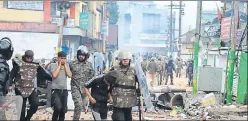  ?? HT PHOTO ?? ▪ Police arrest protesters in Shillong on Saturday.