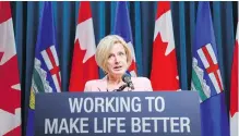  ?? JEFF McINTOSH, THE CANADIAN PRESS ?? Alberta Premier Rachel Notley discusses pipeline expansion with reporters in Calgary on Thursday.