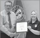  ?? Mona Weatherly ?? Above, EMT Lacey Fiorelli, right, accepts her life-saving certificat­e from Mayor Rod Sonnichen. Additional photos are on page A7.