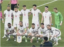  ??  ?? The England players ahead of the EURO 2020 final against Italy.