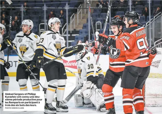  ?? PHOTO SIMON CLARK ?? Aleksei Sergeev et Philipp Kurashev ont connu une deuxième période productive pour les Remparts en participan­t à trois des six buts des leurs.