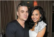  ?? BUCKNER / GETTY IMAGES FOR INSTYLE
MICHAEL ?? Actor Mark Salling (left) and actress Naya Rivera attend the celebratio­n of “Glee’s” Golden Globe nomination­s with InStyle and 20th Century Fox held at Sunset Tower on Jan. 9, 2010, in West Hollywood, California.