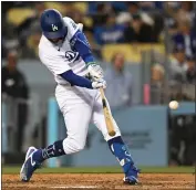  ?? DAVID CRANE – STAFF PHOTOGRAPH­ER ?? Chris Taylor of the Dodgers breaks a scoreless tie with a tworun single in the second inning Tuesday against the Giants.