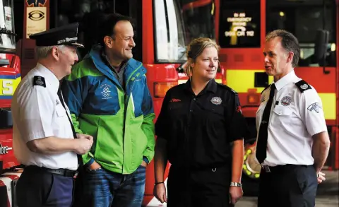  ??  ?? ENGINE ROOM: Taoiseach Leo Varadkar chats to Assistant Chief Fire Officer Dennis Kelly, Sub Officer Caroline Byrne and Paul LeStrange, Station Officer, at North Strand Fire Station, Dublin, during a visit yesterday. Photo: Steve Humphreys