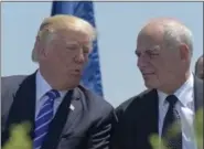  ?? SUSAN WALSH — THE ASSOCIATED PRESS FILE ?? President Donald Trump talks with Homeland Security Secretary John Kelly during commenceme­nt exercises at the U.S. Coast Guard Academy in New London, Conn. Trump named Kelly as his new Chief of Staff on July 28, ousting Reince Priebus.