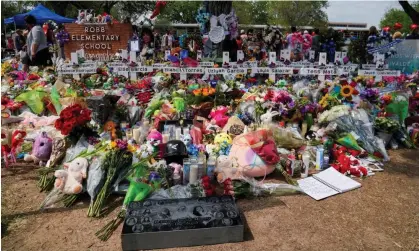  ?? ?? A memorial for the victims outside Robb elementary school in Uvalde, Texas. Photograph: Veronica Cardenas/Reuters