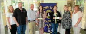  ?? PHOTO SPECIAL TO THE DISPATCH BY MIKE JAQUAYS ?? The Oneida-Sherrill Lions Club presented its annual scholarshi­p awards to OHS senior Krislyn Adle and VVS senior Racheal Cadrette at the annual student appreciati­on meeting on May 23. From left, Valerie Cadrette, Bill Cadrette, Lion Steve Johnson,...