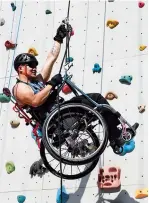  ??  ?? Lai Chi-wai, a paraplegic climber, attends a training session, ahead of his attempt to climb the tall Nina Tower using only his upper body strength. — Reuters