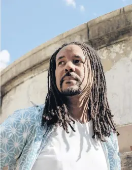  ?? JASMINE CLARKE/THE NEW YORK TIMES ?? After winning back-to-back Pulitzers for “The Undergroun­d Railroad” and “The Nickel Boys,” author Colson Whitehead took another detour with his 10th book and first crime novel,
“Harlem Shuffle.”