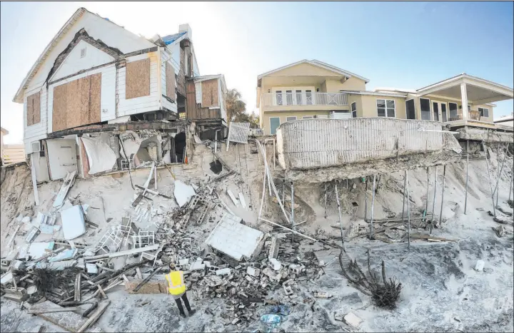  ?? Joe Burbank Tribune News Service ?? Gutted homes north of Toronita Avenue Beach Park in Wilbur-by-the-sea, Fla., in 2022. Homeowners insurance costs in the U.S. hit roughly $175 billion in 2023.