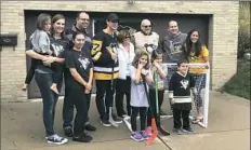  ?? Matt Vensel/Post-Gazette ?? Sidney Crosby poses for a picture while visiting Villiotti family Monday in Scott Township.