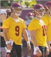  ?? Luis Sinco Los Angeles Times ?? KEDON SLOVIS, left, added an unexpected level of competitio­n for JT Daniels at the quarterbac­k spot.