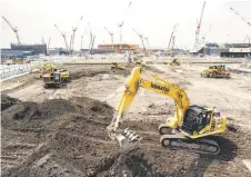  ?? ?? Constructi­on underway at the site of the 2025 Expo on Yumeshima island, an area of reclaimed land in Osaka.