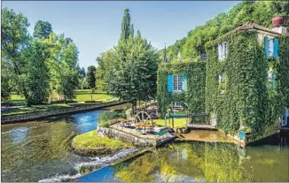  ??  ?? THE DRONNE river provides a lovely setting for the hotel Moulin de l’Abbaye in Brantôme.