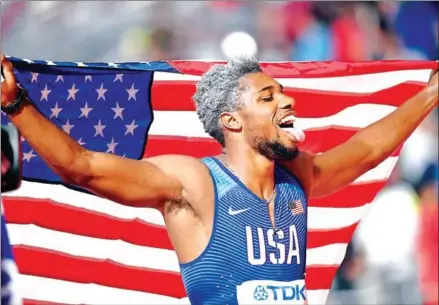  ?? JEWEL SAMAD/AFP ?? USA’s Noah Lyles celebrates winning gold in the men’s 200m final at the 2019 IAAF Athletics World Championsh­ips at the Khalifa Internatio­nal stadium in Doha on Tuesday.