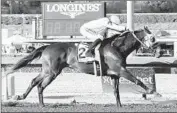  ?? Benoit Photo ?? JOCKEY Joseph Talamo guides Tarabilla Farms’ Melatonin to win in the Santa Anita Handicap.