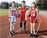  ?? Ned Gerard / Hearst Connecticu­t Media ?? Cheshire High School sophomore track athlete Matthew Reid poses with his sisters, Sarah, left, and Emily, right, on Monday. Sarah is a freshman basketball player at Cheshire High and seventh-grader Emily plays basketball at Dodd Middle School.