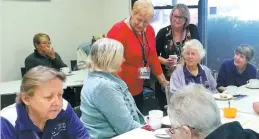  ??  ?? Vision Australia’s Recreation Program participan­ts regularly enjoy diverse activities, excursions and good company. Clients, carers and volunteers are seen here at Vision Australia’s Warragul Centre with Recreation Support Worker, Sandra Fitzpatric­k...