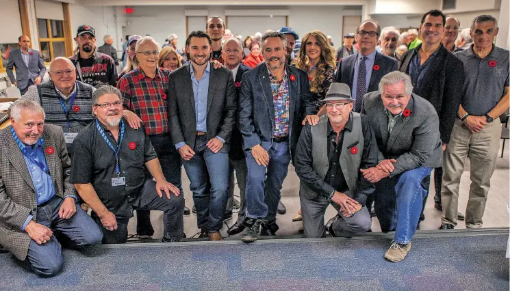  ?? Photo | Rhett Miller ?? The PROSTAID Calgary group poses during a General Meeting that featured W. Brett Wilson as guest speaker. Stewart Campbell is pictured on the left wearing plaid.