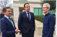  ??  ?? Taoiseach Leo Varadkar, centre, with Apple CEO Tim Cook, right