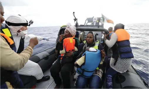 ??  ?? Help: Irish humanitari­an mission in the Mediterran­ean Sea