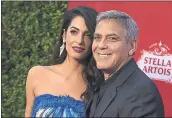  ?? THE ASSOCIATED PRESS FILE ?? Amal and George Clooney say they are inspired by the survivors-turned-activists from Parkland, Fla.