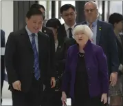  ?? AP PHOTO/ TATAN SYUFLANA, POOL ?? U.S. Treasury Secretary Janet Yellen, center right, talks with Governor of the People’s Bank of China Pan Gongsheng as they meet at the People’s Bank of China in Beijing Monday, April 8, 2024.