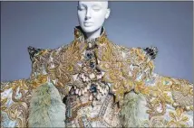  ?? CONTRIBUTE­D BY SCAD FASH / KEVIN WELLS ?? Chinese designer Guo Pei’s “One Thousand and Two Nights” collection is featured in an exhibit at SCAD FASH Museum of Fashion+ Film through March 4.