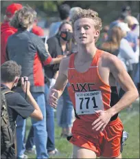  ??  ?? Carson Nicoletti approaches the finish line at the Macomb County championsh­ip meet at Freedom Hill County Park on Friday. The senior became the first Utica runner to win the event.