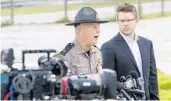  ?? BRAD MCCLENNY/AP ?? Florida Highway Patrol Lt. Patrick Riordan, along with Troy Roberts, the spokespers­on for the Florida Department of Transporta­tion, updates the media Friday about the crash.