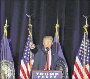  ?? JOHN LOCHER / ASSOCIATED PRESS ?? Republican presidenti­al nominee Donald Trump fires up a crowd Thursday during a rally in Bedford, N.H., where he promised a bright, clean future.