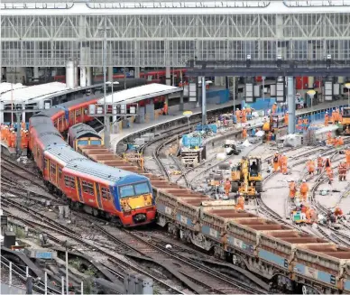  ?? JAMIE SQUIBBS. ?? On August 15 2017, South West Trains 456015 rests at an angle at London Waterloo. It had derailed moments after leaving the terminus, striking a barrier train.