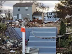  ?? Bloomberg photo by Victor J. Blue ?? A 2012 photo shows the front steps of a home obliterate­d by Hurricane Sandy in Union Beach, N.J.