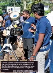  ?? PIX BY KUSHAN PATHIRAJA ?? Crowds and enthusiast­s flocked to witness the annular solar eclipse at Iranamadu in the Northern Province yesterday morning, Iranamadu is located 325 kms away from Colombo.