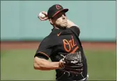  ?? MICHAEL DWYER — THE ASSOCIATED PRESS ?? The Orioles’ John Means pitches during the first inning against the Red Sox on Friday in Boston.