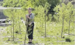  ?? PHOTO: GERARD O’BRIEN ?? Concern . . . Judith O’Connor, of Outram, says willow trees planted at Outram Glen, alongside the Taieri River, could be more of a problem than a solution.