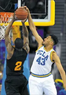  ??  ?? Jonah Bolden, right, played one year at UCLA, then left for Europe. He hopes to return via the draft Thursday night.