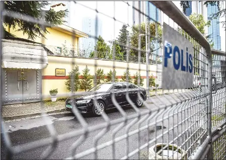  ??  ?? A Saudi Arabian diplomatic vehicle waits behind a police fence at the Saudi Arabian consulate in Istanbul on Oct 14. Turkey on Oct 13 accused Saudi Arabia of failing to cooperate with a probe into the disappeara­nce of a journalist inside its Istanbul consulate, as US President Donald Trump threatened ‘severepuni­shment’ if it turns out he was killed. (AFP)