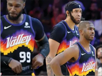  ?? MATT YORK — THE ASSOCIATED PRESS ?? Suns point guard Chris Paul, right, Jae Crowder (99) and JaVale McGee react to a call during Phoenix's 123-90loss to Dallas in Game 7of their playoff series Sunday. The Suns had the NBA's best regular-season record (64-18).