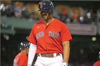  ?? ?? DOWN AND OUT: Xander Bogaerts grimaces after flying out in the eighth inning.